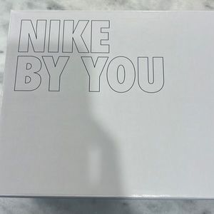 Brand new nike custom soccer cleats size 6 1/2 but fit like 5 1/2